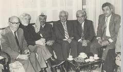 With Arafat and Mahmoud Abbas (right), Tunis, 1989